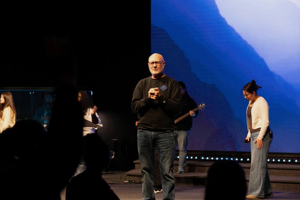 Praying with people at the front